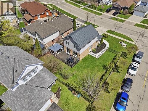 Modern home with a dark metal roof, light-colored siding, and brick accents - 209 Briarmeadow Drive, Kitchener, ON - Outdoor With View