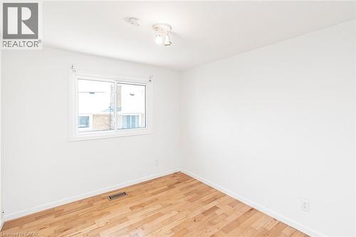 Room featuring light wood flooring and white baseboards - 100 Mountain Avenue N, Hamilton, ON - Indoor Photo Showing Other Room