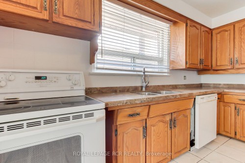 77 Alhart Drive, Toronto, ON - Indoor Photo Showing Kitchen With Double Sink