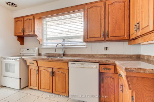 77 Alhart Drive, Toronto, ON - Indoor Photo Showing Kitchen With Double Sink
