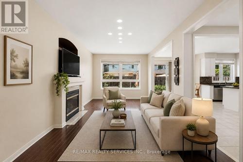 3696 Waterfall Crescent, Mississauga, ON - Indoor Photo Showing Living Room With Fireplace