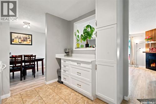 416 425 115Th Street E, Saskatoon, SK - Indoor Photo Showing Other Room With Fireplace