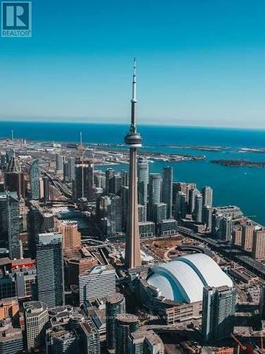 Arial View 0f Bldg + CN Tower & Lake Ontario - 4406 - 300 Front Street W, Toronto, ON - Outdoor With Body Of Water With View