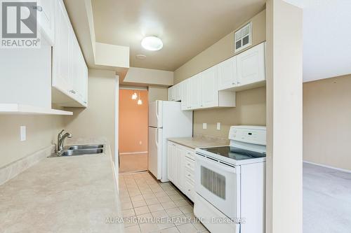 401 - 3077 Weston Road, Toronto, ON - Indoor Photo Showing Kitchen With Double Sink