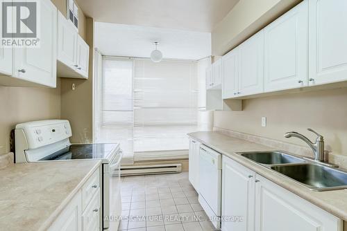 401 - 3077 Weston Road, Toronto, ON - Indoor Photo Showing Kitchen With Double Sink