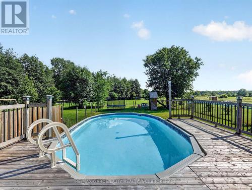 828 Foss Road, Pelham (Fenwick), ON - Outdoor With Above Ground Pool With Deck Patio Veranda