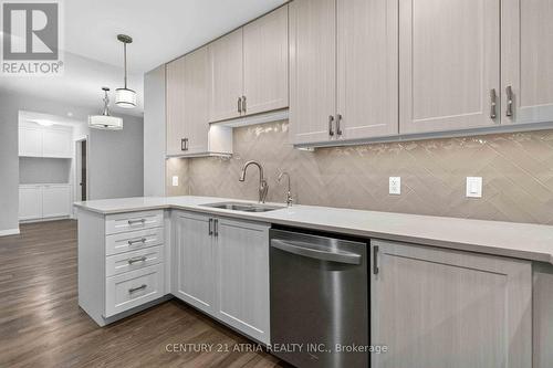 306 - 460 William Graham Drive, Aurora, ON - Indoor Photo Showing Kitchen With Double Sink With Upgraded Kitchen