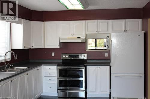 184 Northampton Crescent Unit# B, Waterloo, ON - Indoor Photo Showing Kitchen With Double Sink