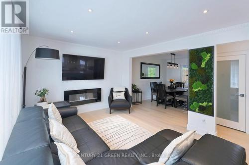 Living Room - 32 Castlebar Road, Toronto, ON - Indoor Photo Showing Living Room With Fireplace