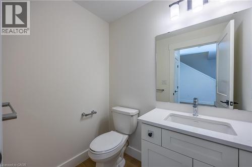 Full bathroom featuring a white vanity with an integrated sink and light-colored countertop - 111 Amber Street, Waterford, ON - Indoor Photo Showing Bathroom