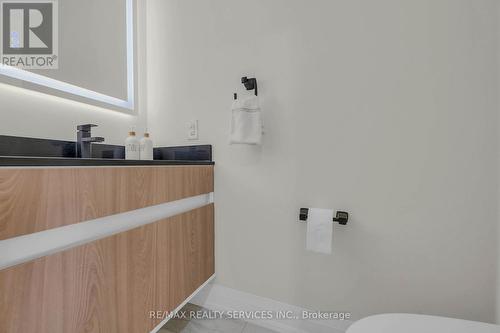 Powder Room - 128 Seaside Circle, Brampton, ON - Indoor Photo Showing Other Room