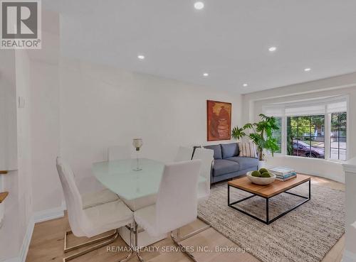 Virtually Staged - Rug and Coffee Table - 128 Seaside Circle, Brampton, ON - Indoor Photo Showing Living Room