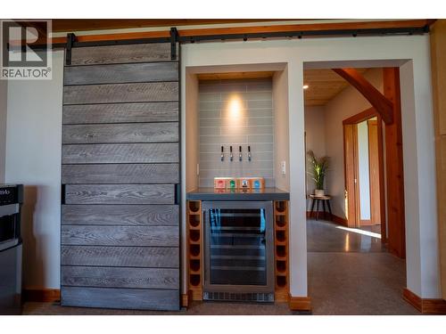 Wine or beer on tap - 1917 Mt Mcpherson Drive, Revelstoke, BC - Indoor Photo Showing Other Room