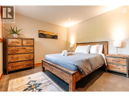 Lwr level bdrm - 1917 Mt Mcpherson Drive, Revelstoke, BC - Indoor Photo Showing Bedroom