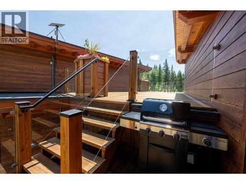 Rooftop deck in owners/caretaker suite - 1917 Mt Mcpherson Drive, Revelstoke, BC - Outdoor With Exterior