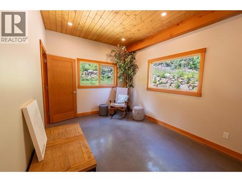 Gym/office in owners/caretaker suite - 1917 Mt Mcpherson Drive, Revelstoke, BC - Indoor Photo Showing Other Room