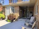 Spacious entry with covered entrance. Since 2020, nearly every major component has been updated, including all new flooring throughout four completely renovated bathrooms with quartz countertops, kitc - 7 Mann Avenue, Simcoe, ON  - Outdoor With Exterior 