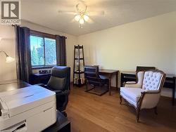 Third bedroom is set up as an office. - 