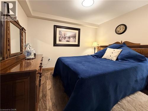 Basement office currently set up as a bedroom. - 7 Mann Avenue, Simcoe, ON - Indoor Photo Showing Bedroom