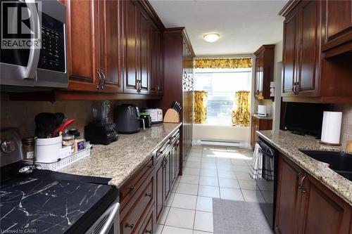 75 Queen Street N Unit# 1204, Hamilton, ON - Indoor Photo Showing Kitchen