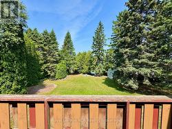 Elevated deck with water view (if trees cleared). - 