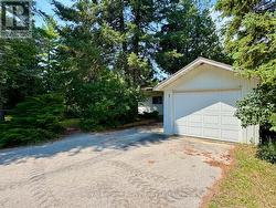 Detached garage & parking for 5+ vehicles. - 