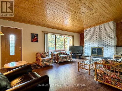 Open concept main floor living room. - 2 William Street, Northern Bruce Peninsula, ON - Indoor Photo Showing Living Room With Fireplace