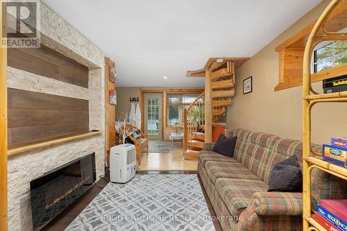 235 Loch Erne Road, Mcdougall, ON - Indoor Photo Showing Living Room With Fireplace
