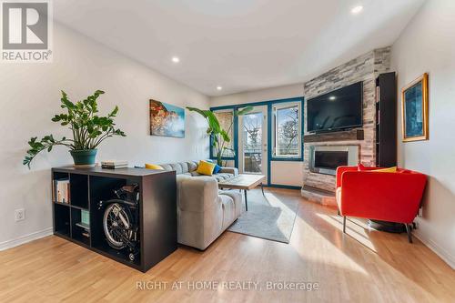 6 - 2 Columbus Avenue, Ottawa, ON - Indoor Photo Showing Living Room With Fireplace