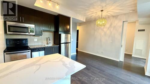723 - 15 James Finlay Way, Toronto, ON - Indoor Photo Showing Kitchen