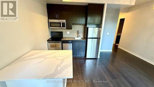 723 - 15 James Finlay Way, Toronto, ON - Indoor Photo Showing Kitchen