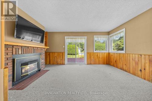 23 Pheasant Run Drive, Ottawa, ON - Indoor Photo Showing Other Room With Fireplace