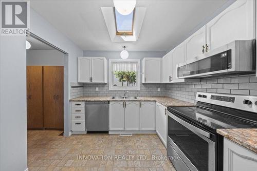 23 Pheasant Run Drive, Ottawa, ON - Indoor Photo Showing Kitchen With Double Sink With Upgraded Kitchen