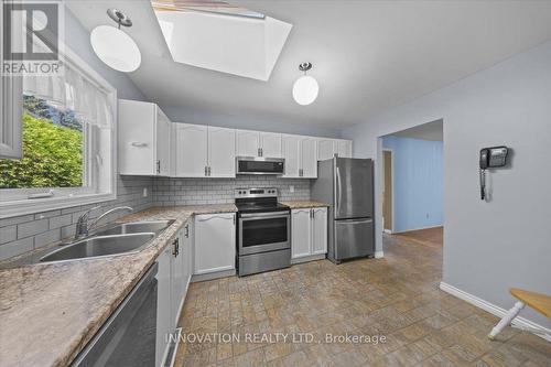 23 Pheasant Run Drive, Ottawa, ON - Indoor Photo Showing Kitchen With Double Sink