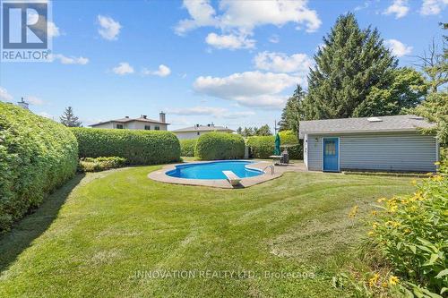 23 Pheasant Run Drive, Ottawa, ON - Outdoor With In Ground Pool
