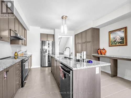 10941 Victoria Square Boulevard, Markham, ON - Indoor Photo Showing Kitchen With Double Sink With Upgraded Kitchen