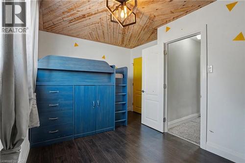 Room featuring wood-finish flooring and a distinctive planked wood ceiling - 485 Cochrane Road, Hamilton, ON - Indoor Photo Showing Other Room