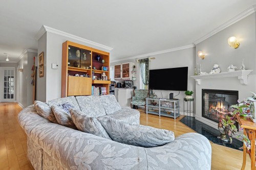 Salon - 202-960 Rue Des Faucons, Sainte-Catherine, QC - Indoor Photo Showing Living Room With Fireplace