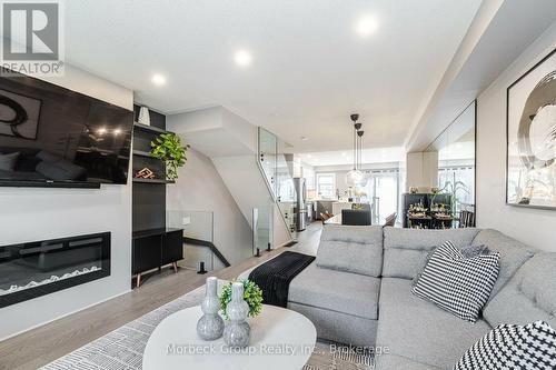 24 - 1100 Begley Street, Pickering (Bay Ridges), ON - Indoor Photo Showing Living Room With Fireplace