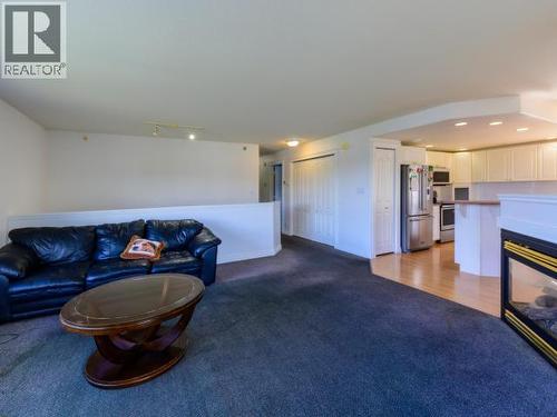 146 Falcon Drive, Whitehorse, YT - Indoor Photo Showing Living Room With Fireplace