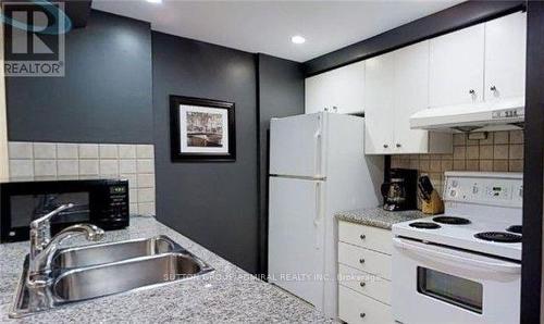 722 - 168 Simcoe Street, Toronto, ON - Indoor Photo Showing Kitchen With Double Sink