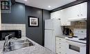 722 - 168 Simcoe Street, Toronto, ON  - Indoor Photo Showing Kitchen With Double Sink 
