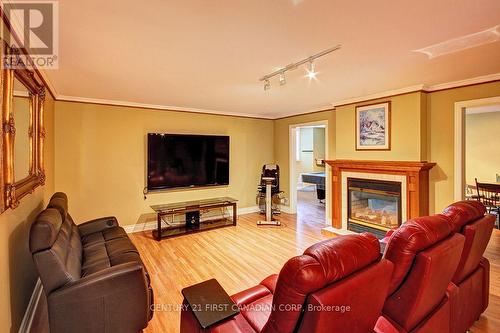 581 Plane Tree Drive, London North (North R), ON - Indoor Photo Showing Living Room With Fireplace