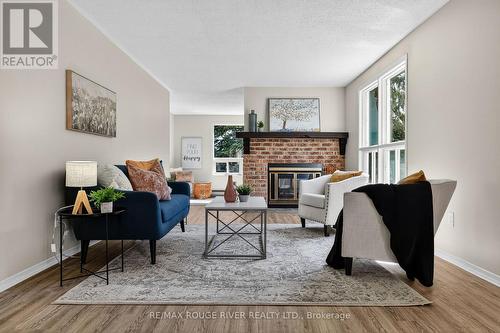22 Eastbank Road, Clarington (Newcastle), ON - Indoor Photo Showing Living Room With Fireplace