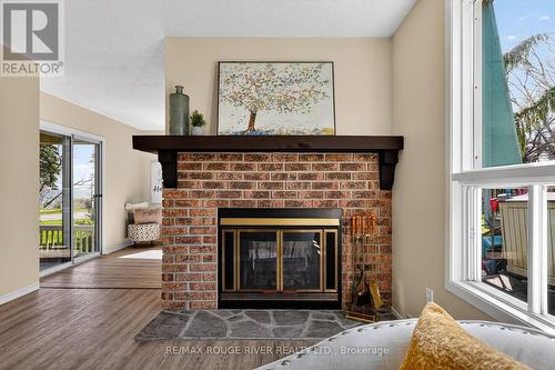 22 Eastbank Road, Clarington (Newcastle), ON - Indoor Photo Showing Living Room With Fireplace