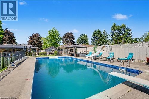 52 Lorne Avenue, Burford, ON - Outdoor With In Ground Pool With Backyard