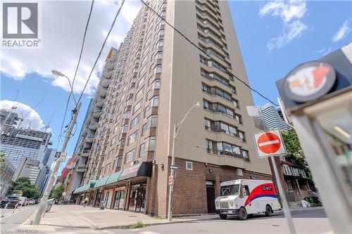 High-rise building featuring a light-toned facade and extensive window lines - 96 Gerrard St E, Toronto, ON 