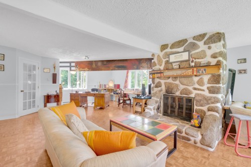 Salon - 1018 Ch. Des Nations, Sainte-Anne-Des-Lacs, QC - Indoor Photo Showing Living Room With Fireplace