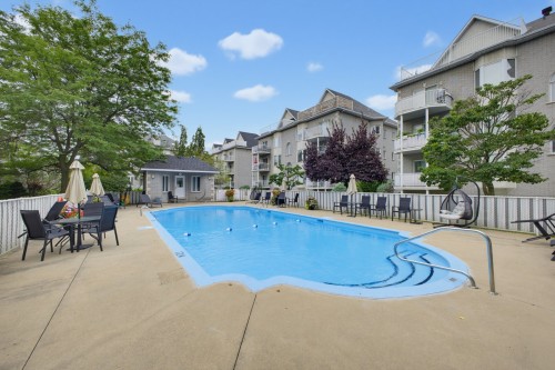 Piscine - 202-1870 Rue Senkus, Montréal (Lasalle), QC - Outdoor With In Ground Pool