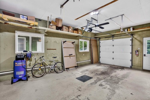 Garage - 14 Rue Boivin, Labelle, QC - Indoor Photo Showing Garage